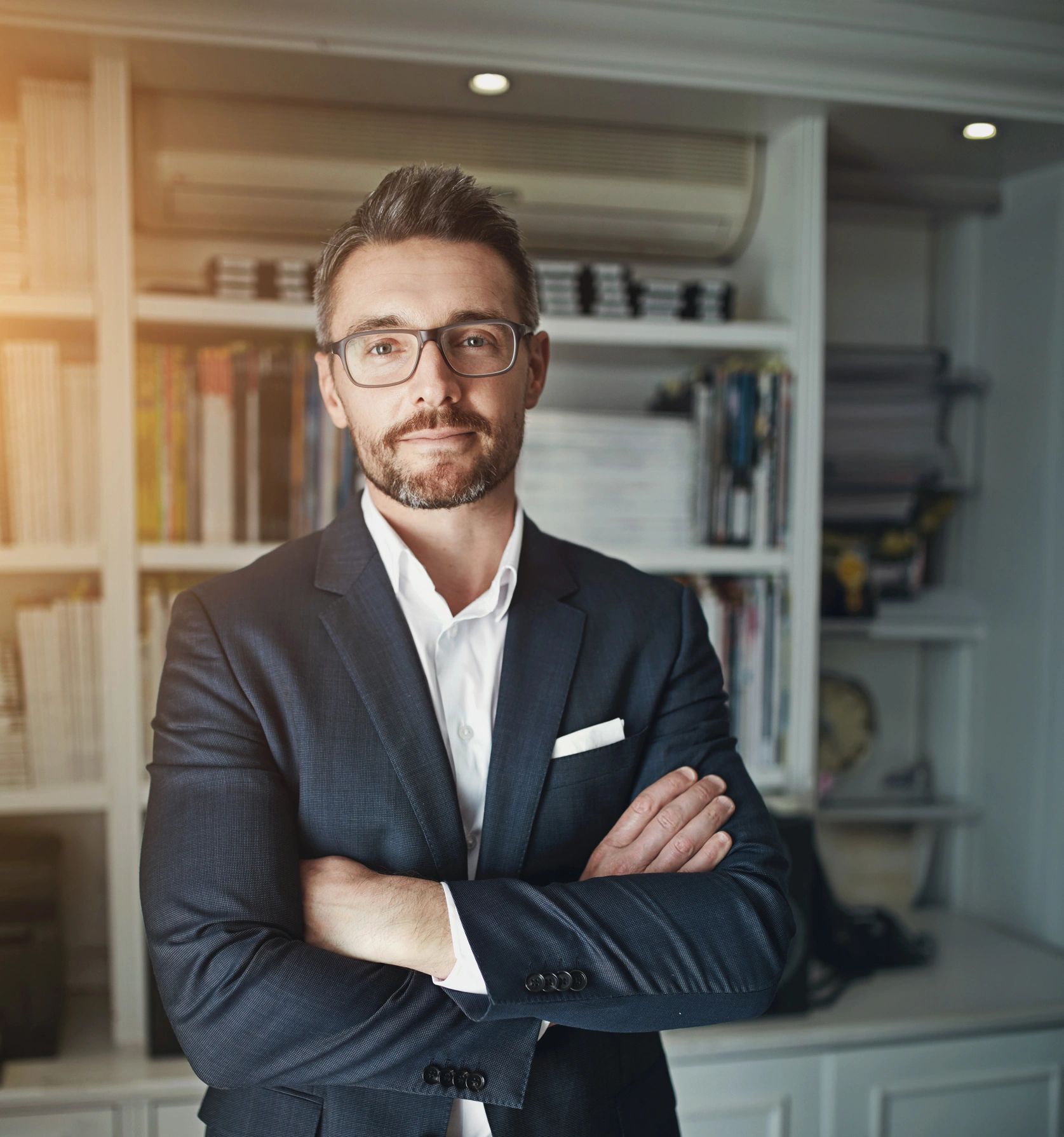 Professional business advisor standing confidently in an office
